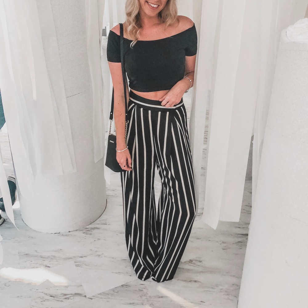 Black and white striped trousers. US 6